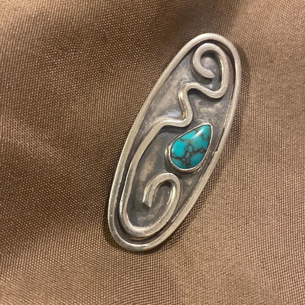 Vintage Carlos Diaz Navajo sterling silver and turquoise brooch.